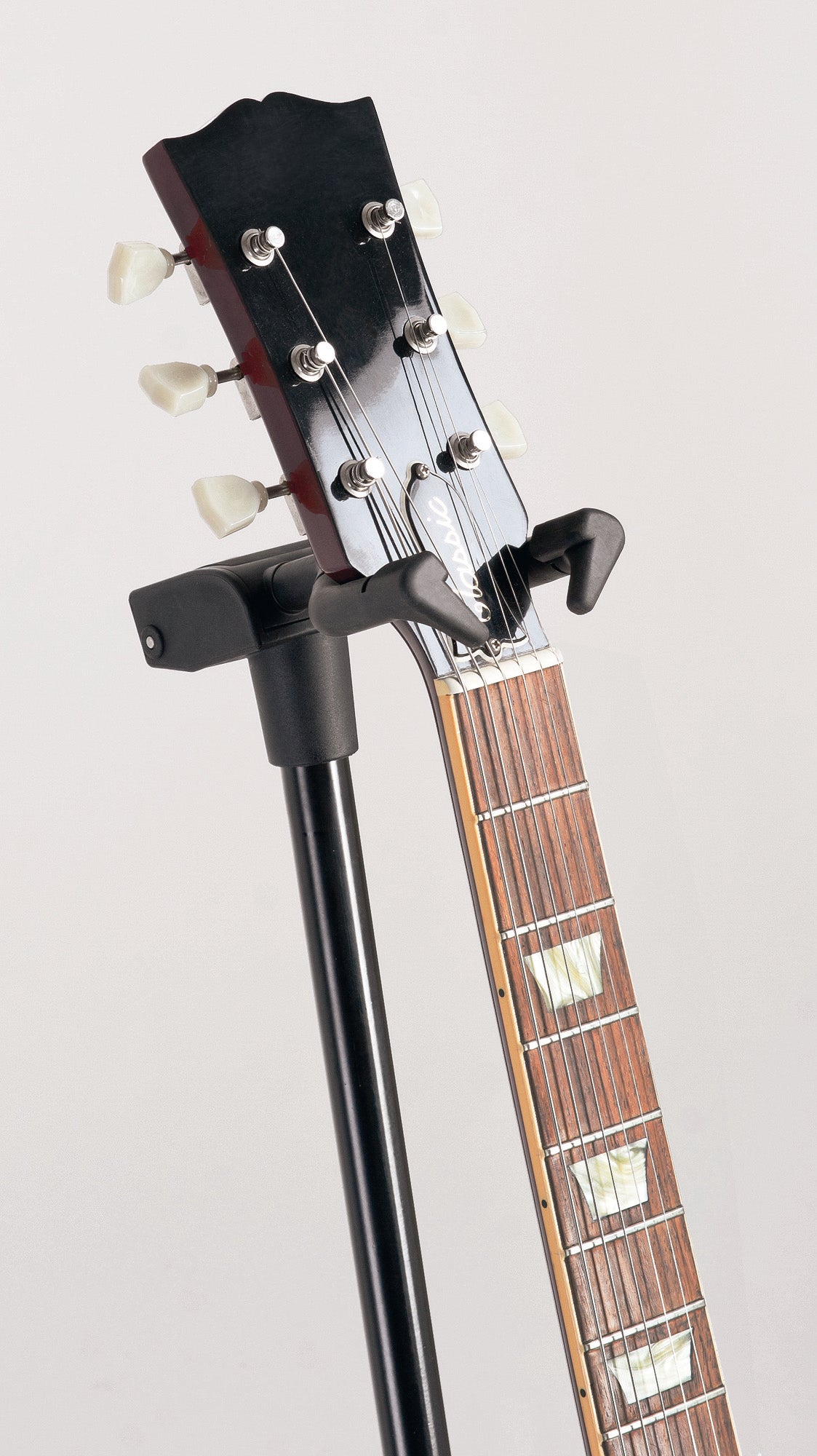 Modèle MEMPHIS PRO, toutes guitares, système de maintien breveté, pieds avec mousses protectrices,